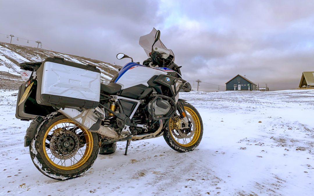 BMW Motorcycle parked at The Lecht car park in winter